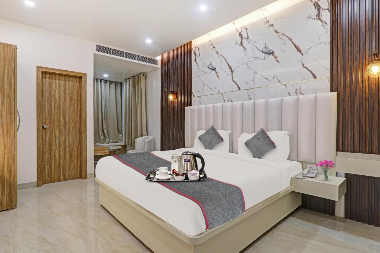 Super Townhouse Hotel Impact Chinhat Bagian luar foto
