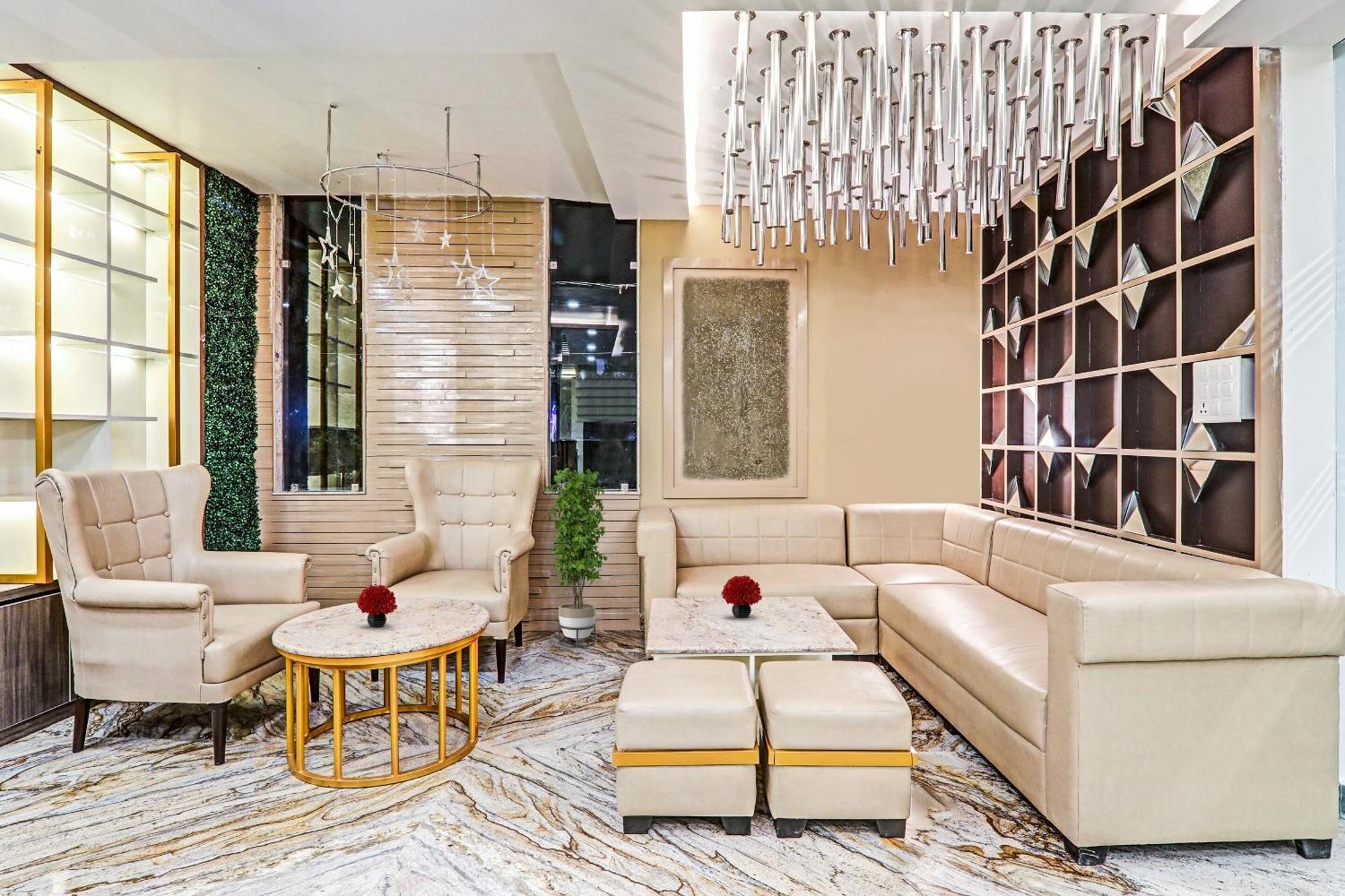 Super Townhouse Hotel Impact Chinhat Bagian luar foto